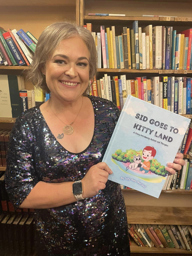 Sally Marshall with book